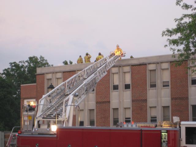 Crews discussing Roof Operations at a drill in Lincoln University.